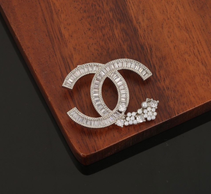 Ch**el brooches